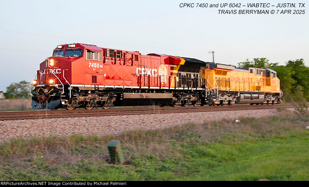 CP ET44AC 7450 and UP AC4400CWM 6042